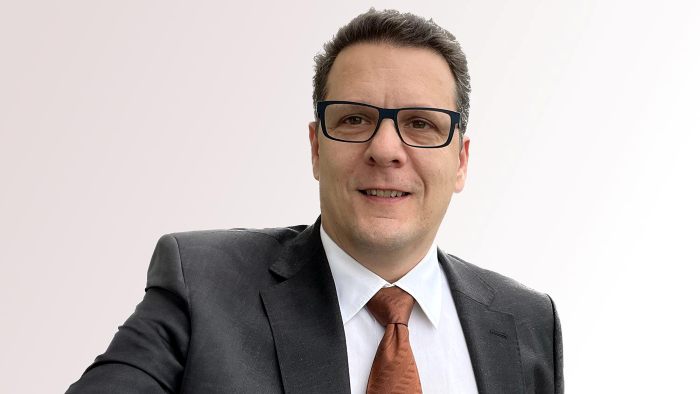 Das Bild zeigt Oliver Schmid, den CISO der Universität Zürich